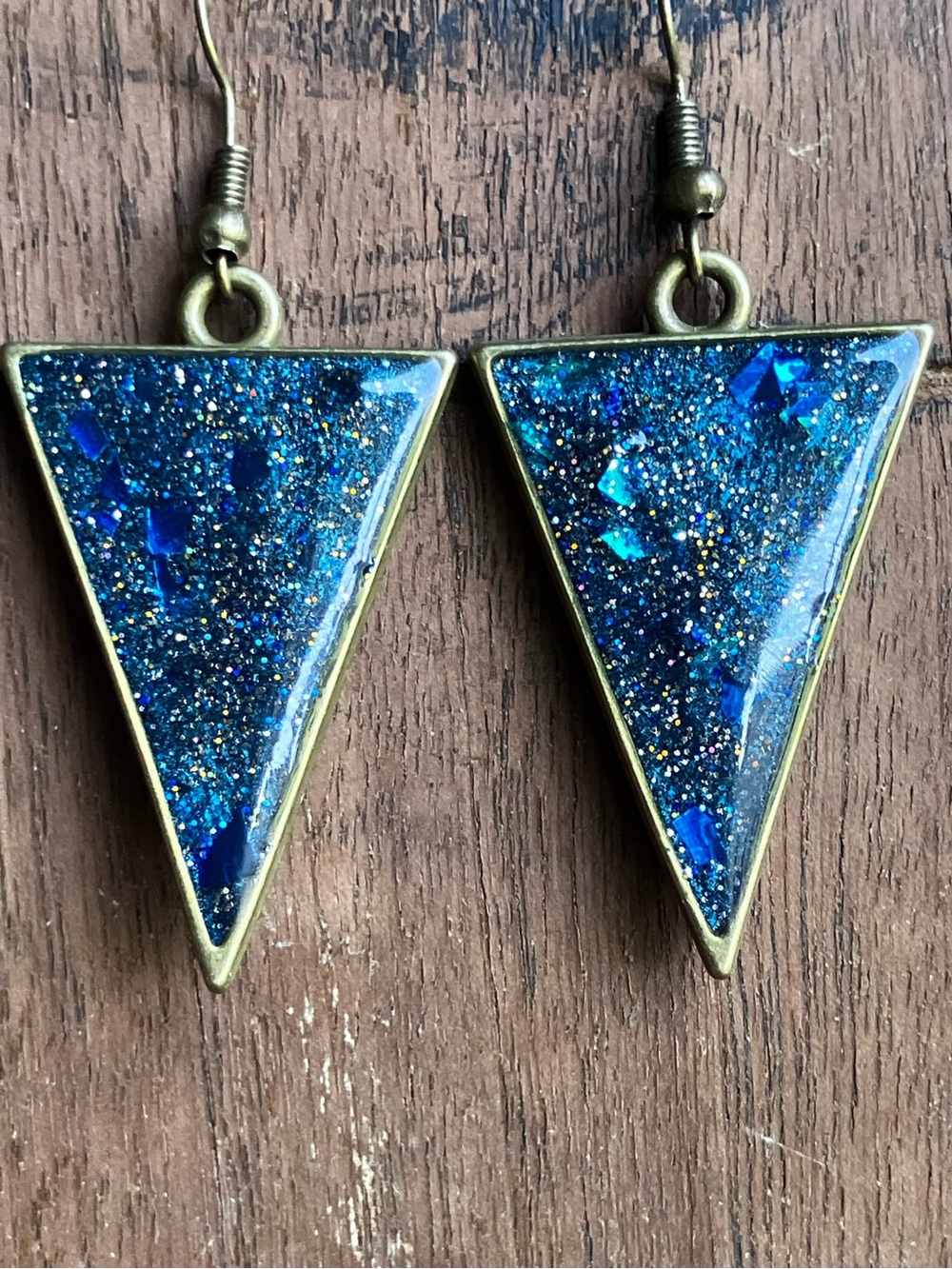 Blue sparkling triangle dangle earrings